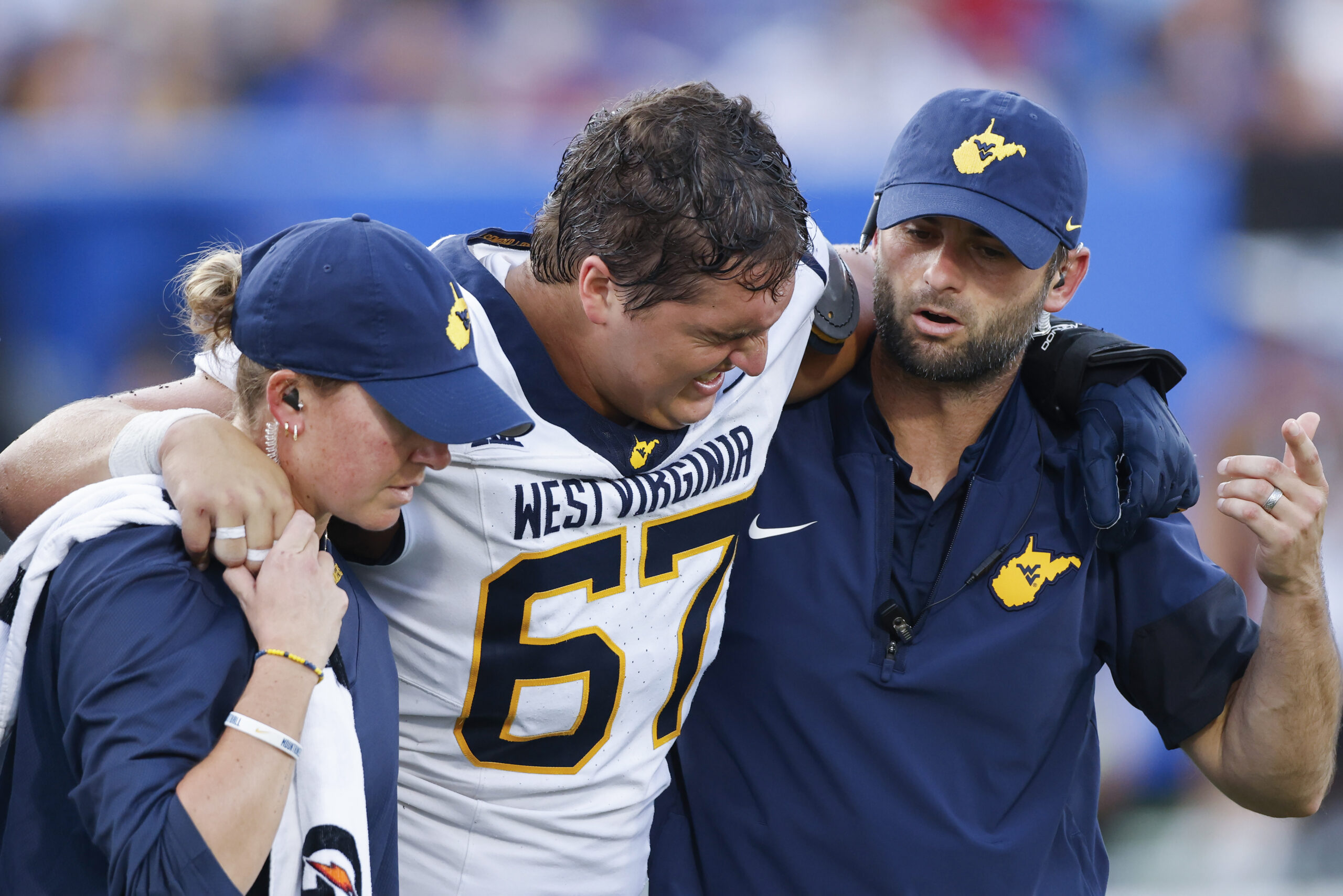 West Virginia piling up injuries, Rich Rodriguez looks to depth to fill holes
